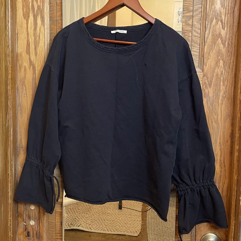 Black terry cloth sweatshirt with drawstring bell sleeves
